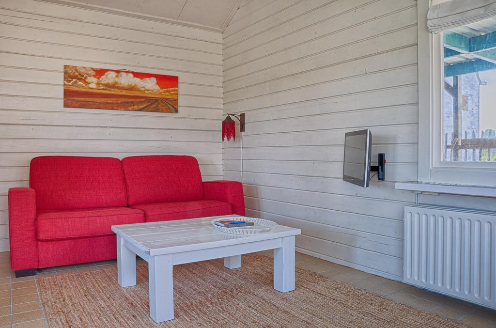 Artistiek Vakantiehuisje Гюлст Номер фото